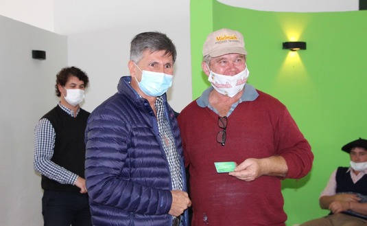 El presidente del INYM, Juan José Szychowsky y el productor Marcelo Luis Doubña